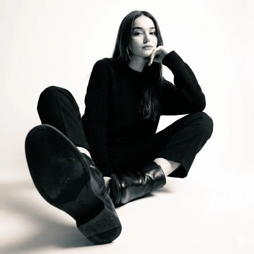 High-Contrast Black-And-White Studio Photo Of A Woman — image prompt preview